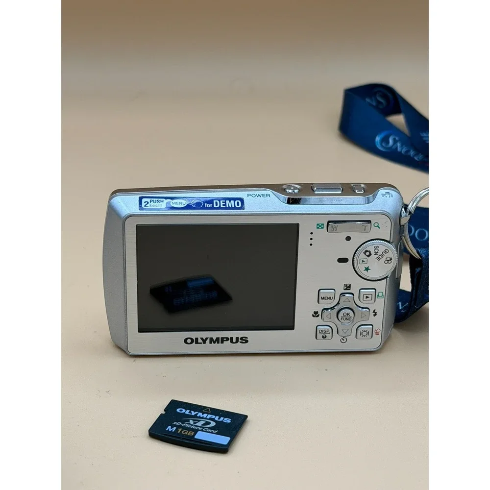 Olympus Stylus 760 7.1MP Digital Camera Silver Tested w/ Charger 1GB xD